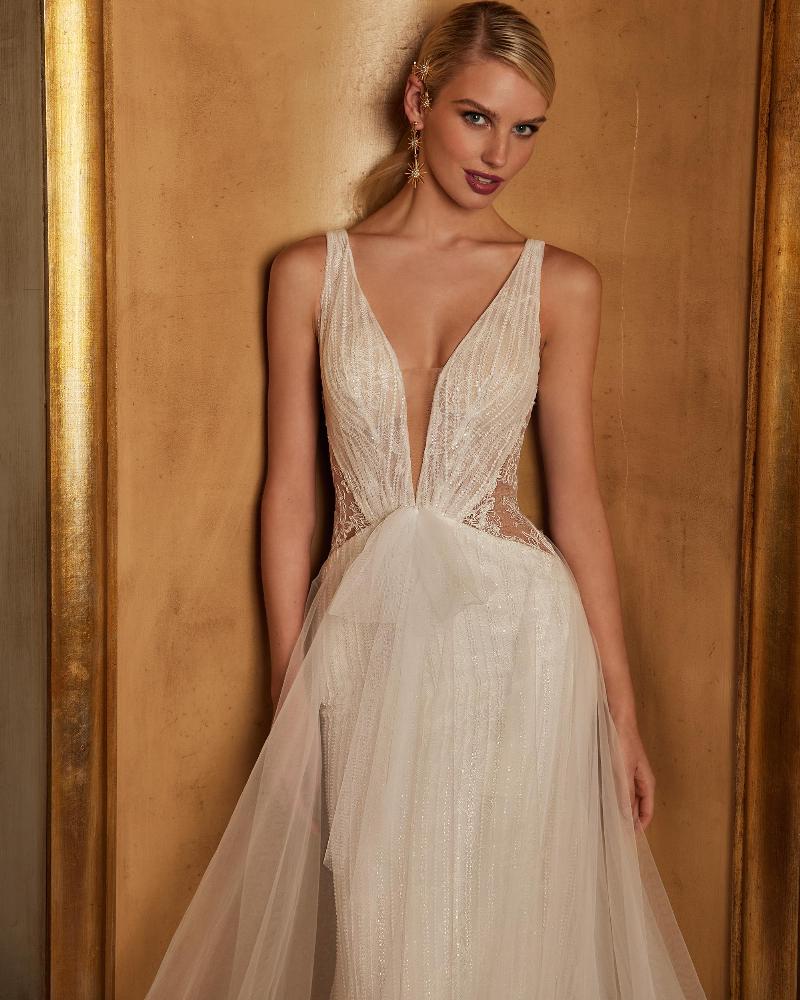 122114 deep v neck wedding dress with straps and a line silhouette3